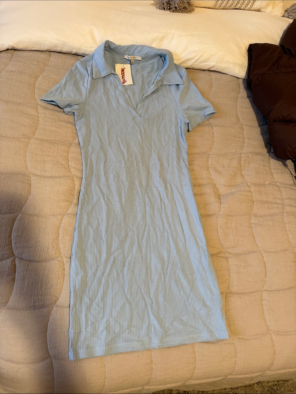 Women's light blue ribbed top with tag
